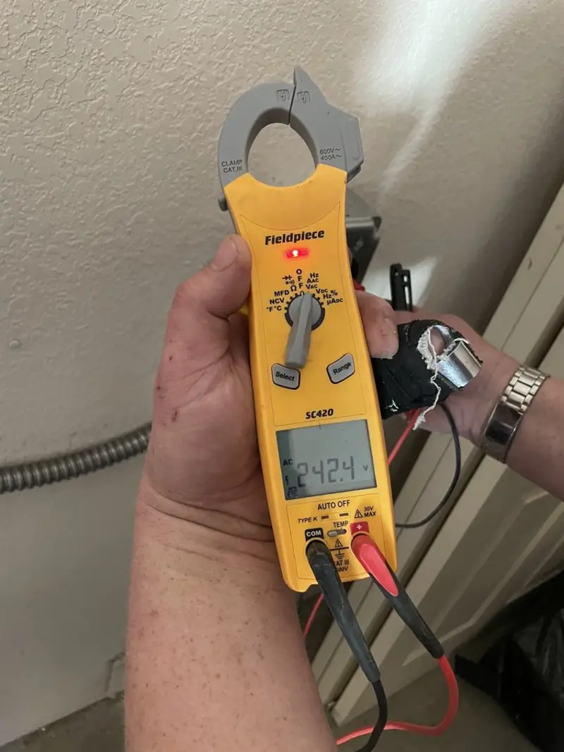 Voltage testing with clamp meter during Generator Installation in Alamosa